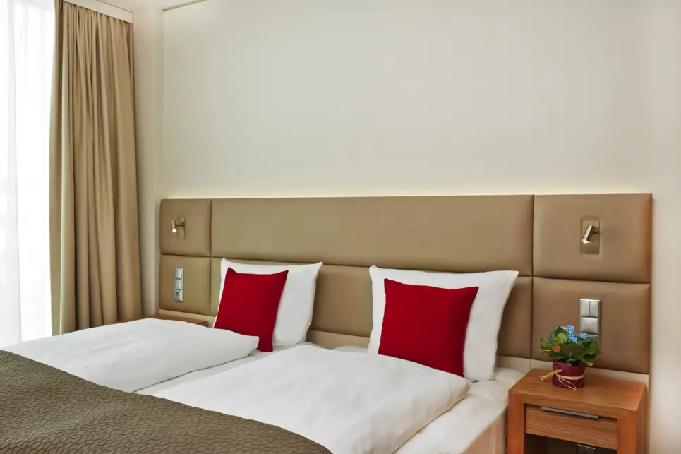 Chambre Confort lit queen size - H4 Hotel München Messe